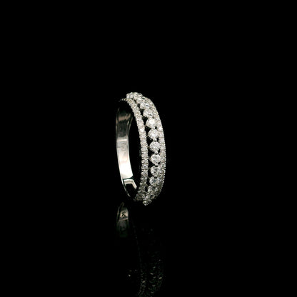 Natural three row diamond wedding band in solid 18K white gold featuring an elevated centre row of round brilliant diamonds with two pavé diamond rows, total diamond weight 0.62 carat.