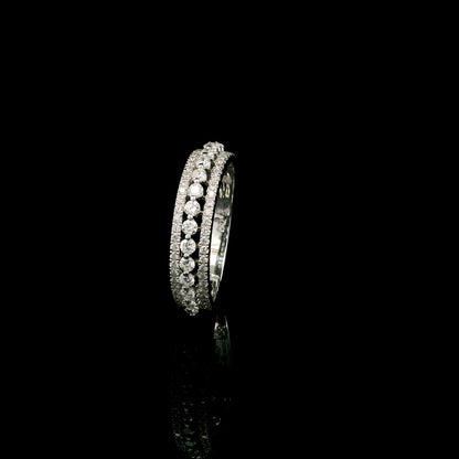 Natural three row diamond wedding band in solid 18K white gold featuring an elevated centre row of round brilliant diamonds with two pavé diamond rows, total diamond weight 0.62 carat.