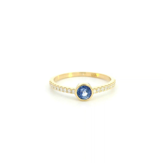 18K yellow gold bezel blue sapphire diamond ring featuring a 0.62 Carat natural round sapphire with diamond-set shoulders.