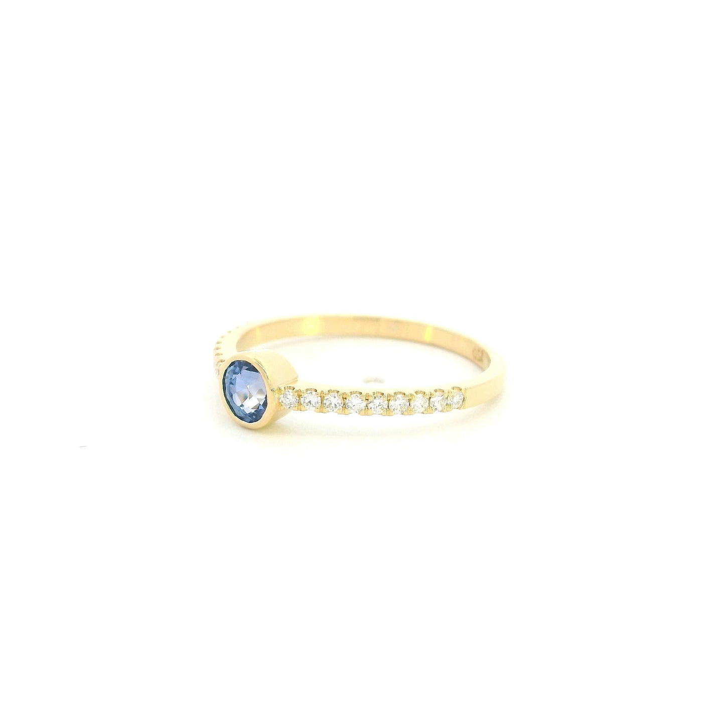 18K yellow gold bezel blue sapphire diamond ring featuring a 0.62 Carat natural round sapphire with diamond-set shoulders.