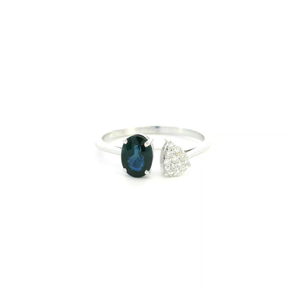 18K white gold blue sapphire diamond open ring featuring a 1.07 Carat natural oval sapphire with a pear-shaped natural diamond cluster.