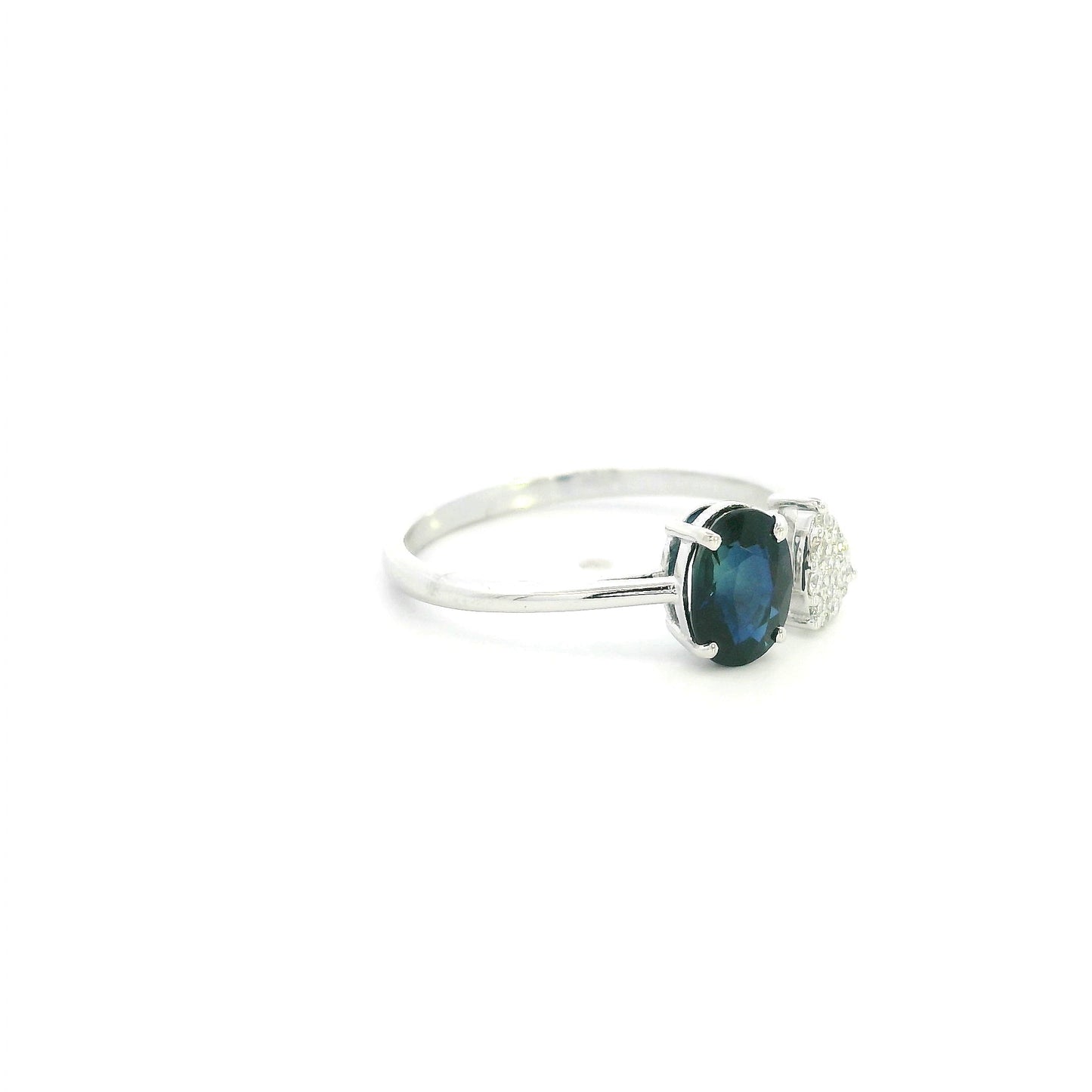 18K white gold blue sapphire diamond open ring featuring a 1.07 Carat natural oval sapphire with a pear-shaped natural diamond cluster.