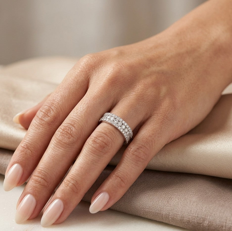 Multi row natural diamond band ring in 18K white gold with round brilliant diamonds and pavé detailing