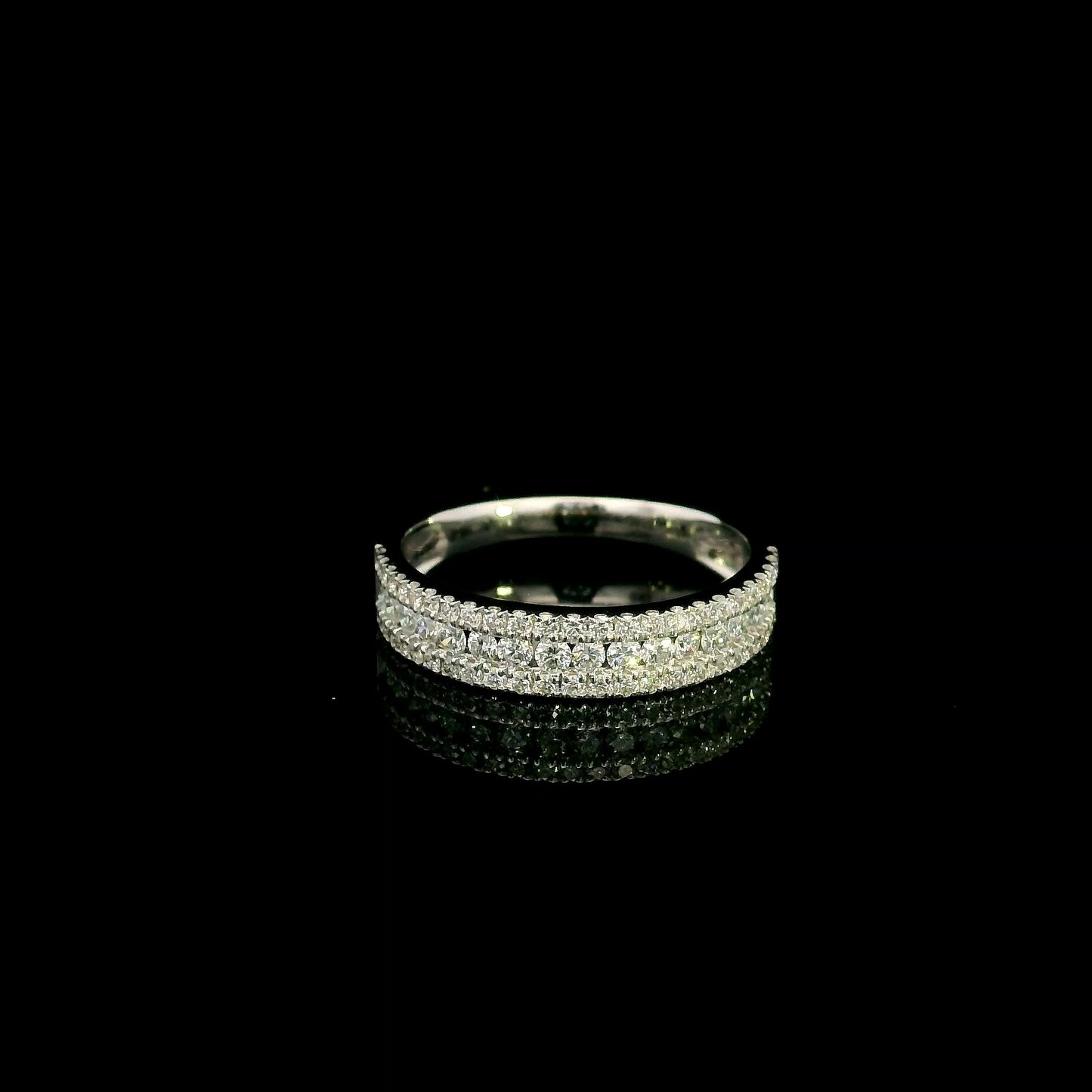 Multi row natural diamond band ring in 18K white gold with round brilliant diamonds and pavé detailing