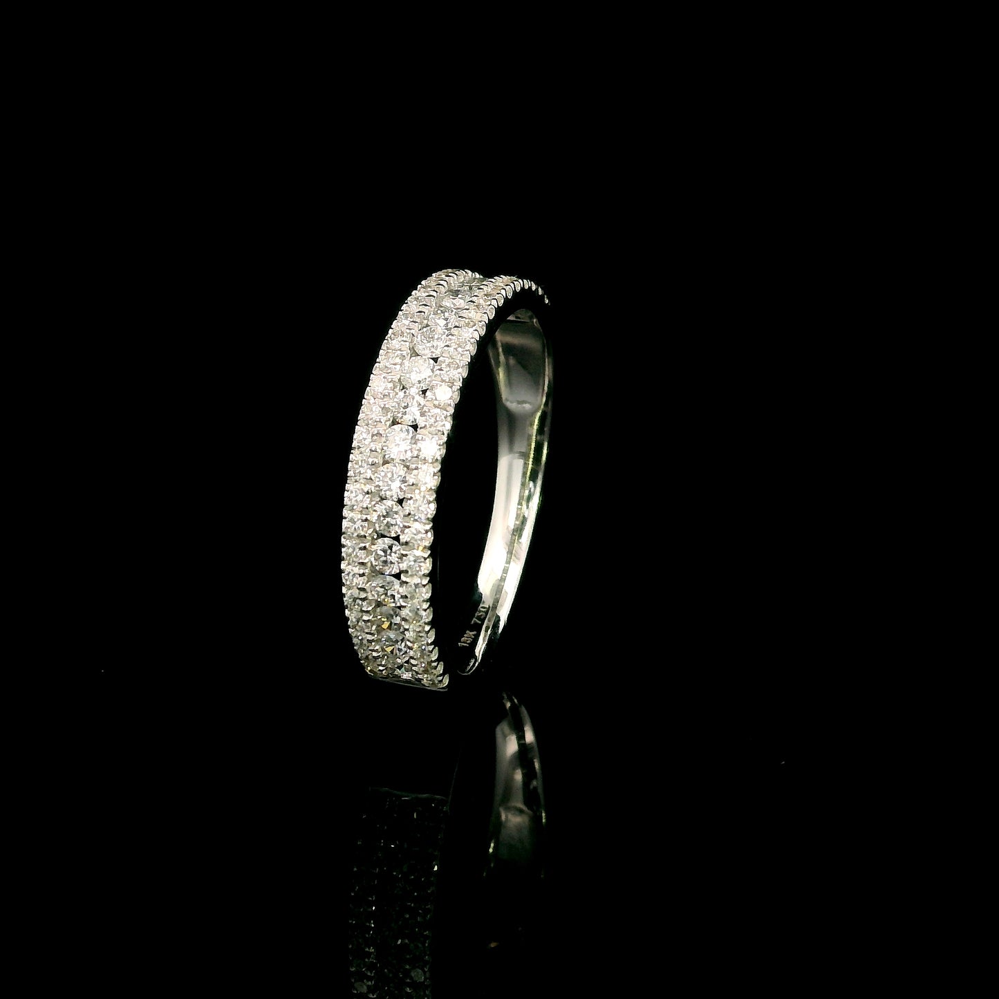 Multi row natural diamond band ring in 18K white gold with round brilliant diamonds and pavé detailing
