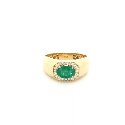 18K yellow gold men's signet ring featuring a 1.15 carat natural oval emerald surrounded by a halo of natural diamonds with a bold polished gold band.