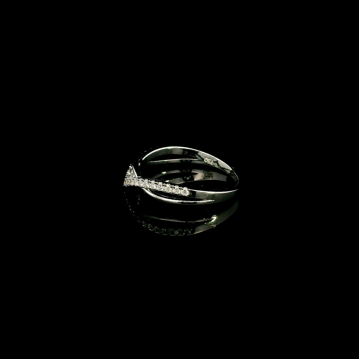 18K white gold diamond crossover ring with curved V shaped design