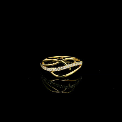 18K yellow gold interwoven diamond ring featuring flowing crossover bands and 0.22 carats of natural round brilliant diamonds.