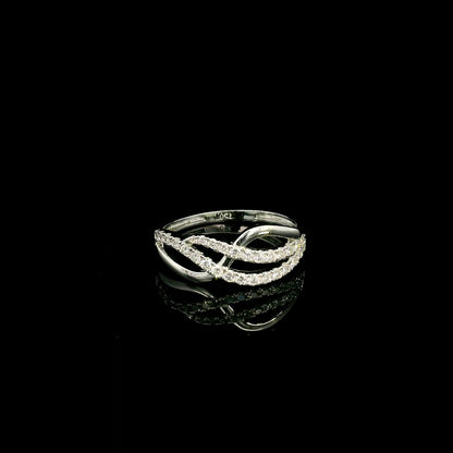18K white gold diamond crossover ring featuring an elegant flowing design with 0.39 carat natural pavé-set diamonds.