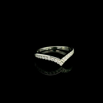 18K white gold chevron diamond wedding band featuring 0.27 carat natural round brilliant diamonds in a pavé setting.