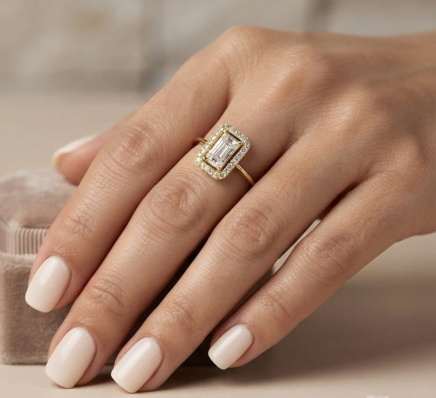 18K yellow gold rectangular halo diamond ring featuring baguette and round natural diamonds with a total diamond weight of 0.37 carats.