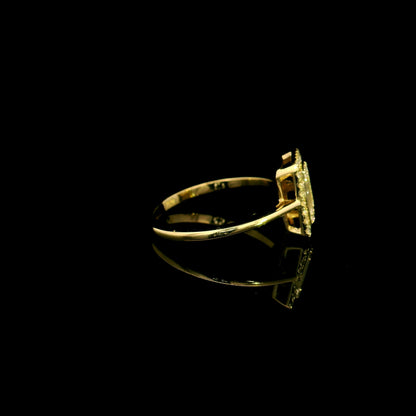18K yellow gold rectangular halo diamond ring featuring baguette and round natural diamonds with a total diamond weight of 0.37 carats.