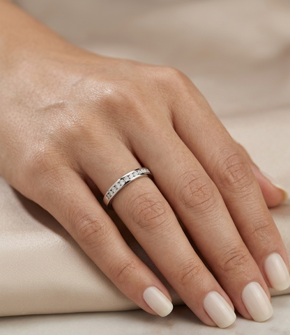 18K white gold channel set diamond wedding band featuring 0.36 carat natural round brilliant diamonds in a sleek polished stackable ring design.