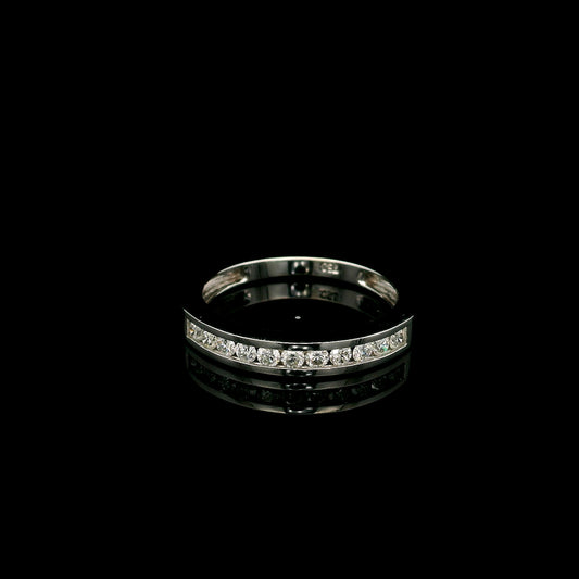 18K white gold channel set diamond wedding band featuring 0.36 carat natural round brilliant diamonds in a sleek polished stackable ring design.