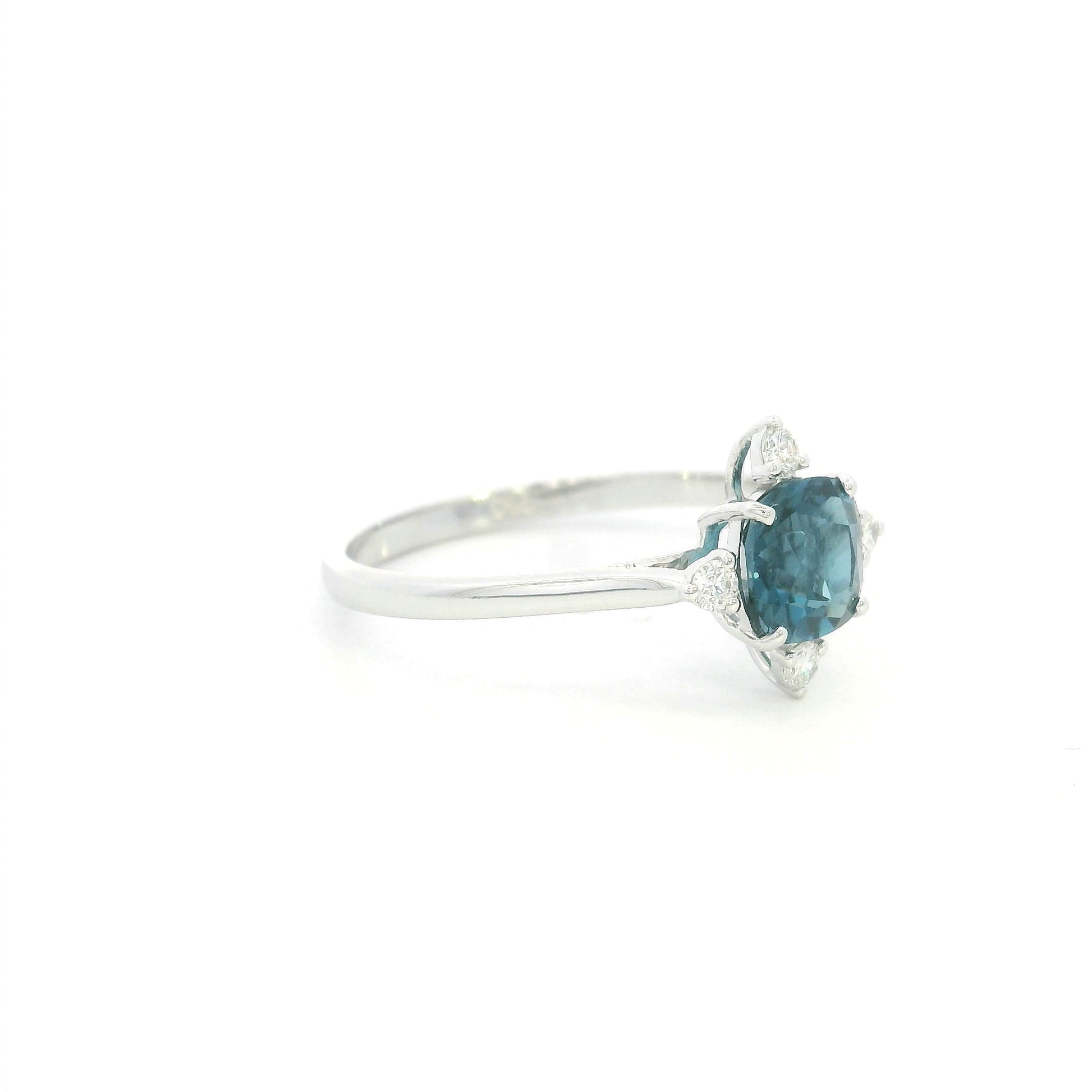 18K white gold London Blue Topaz ring featuring a 1.10 carat natural cushion-cut London Blue Topaz with 0.14 carat natural diamond accents.