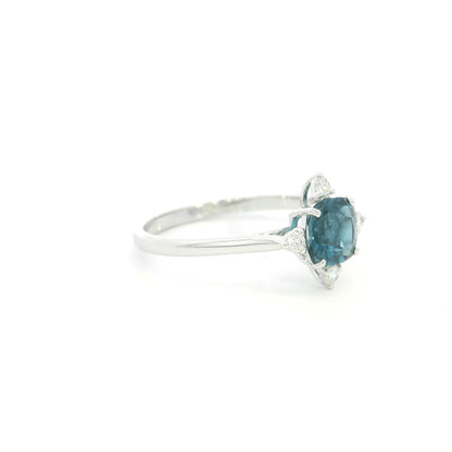 18K white gold London Blue Topaz ring featuring a 1.10 carat natural cushion-cut London Blue Topaz with 0.14 carat natural diamond accents.