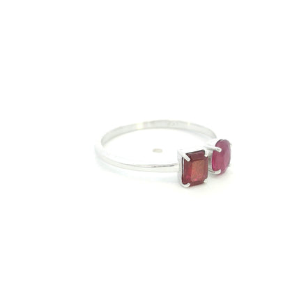 18K White Gold Natural Ruby Toi et Moi Ring featuring an oval and emerald-cut ruby in a modern open design.