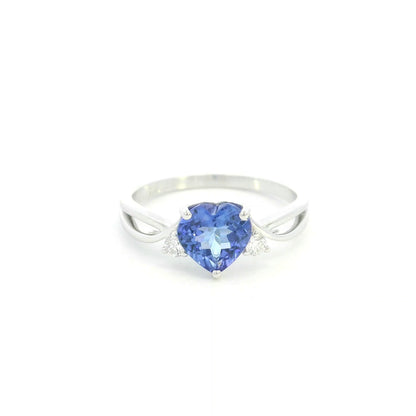 18K white gold heart tanzanite ring featuring a 1.29 carat heart-shaped natural tanzanite with 0.09 carat natural diamond accents.