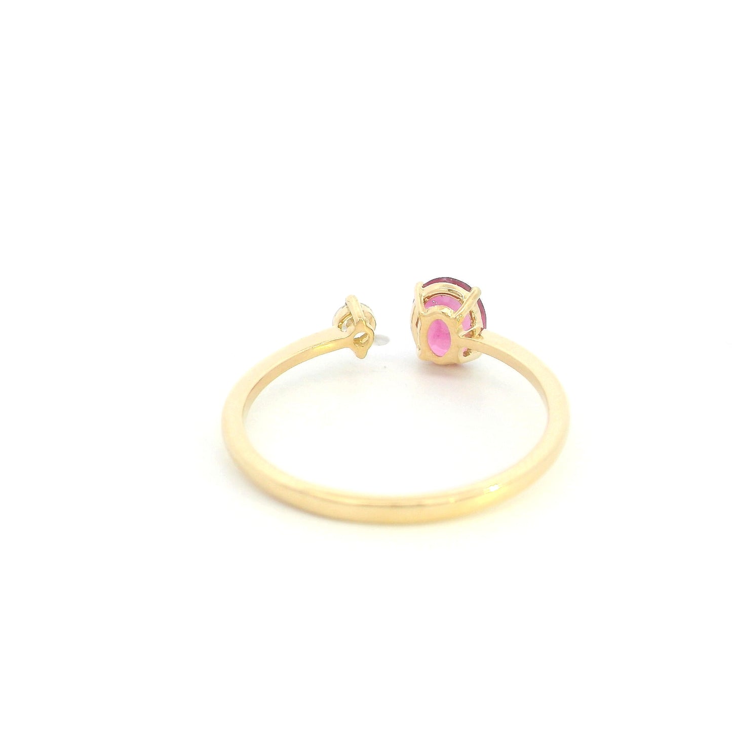 18K yellow gold open ruby and diamond ring with a 0.50 carat oval ruby and natural round diamond