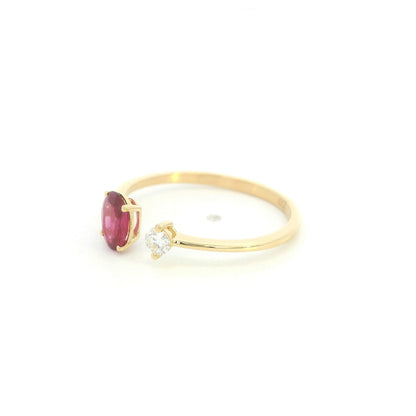 18K yellow gold open ruby and diamond ring with a 0.50 carat oval ruby and natural round diamond