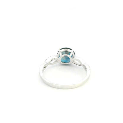 London Blue Topaz diamond ring in 18K white gold with round blue topaz and diamond accented sculpted band