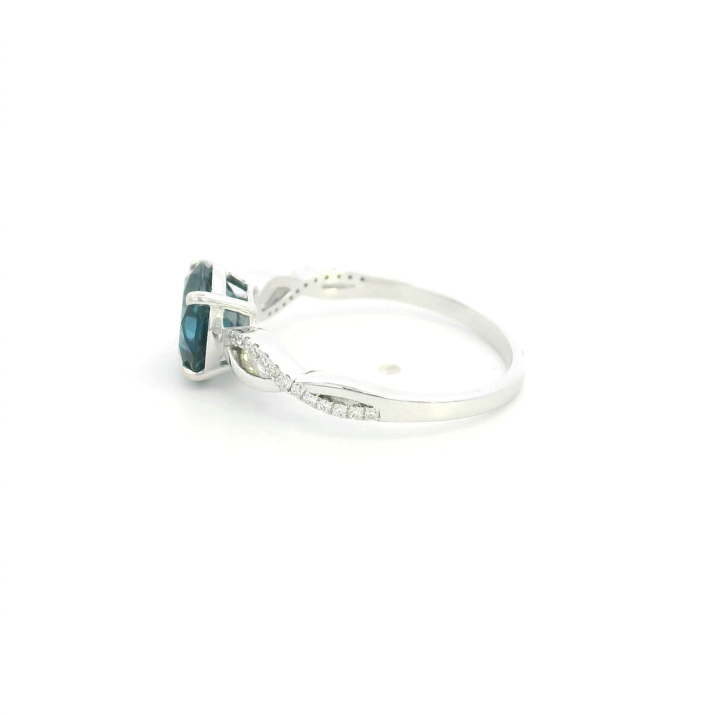 London Blue Topaz diamond ring in 18K white gold with round blue topaz and diamond accented sculpted band