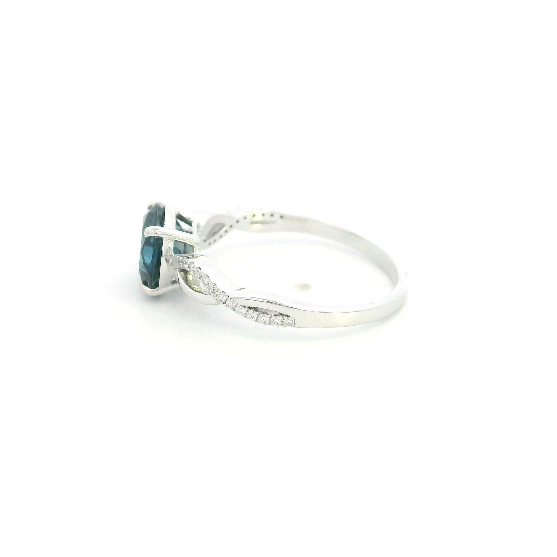 London Blue Topaz diamond ring in 18K white gold with round blue topaz and diamond accented sculpted band