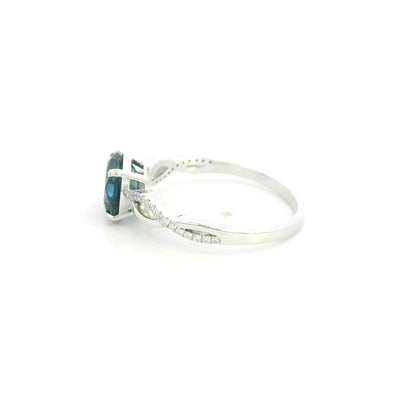 London Blue Topaz diamond ring in 18K white gold with round blue topaz and diamond accented sculpted band