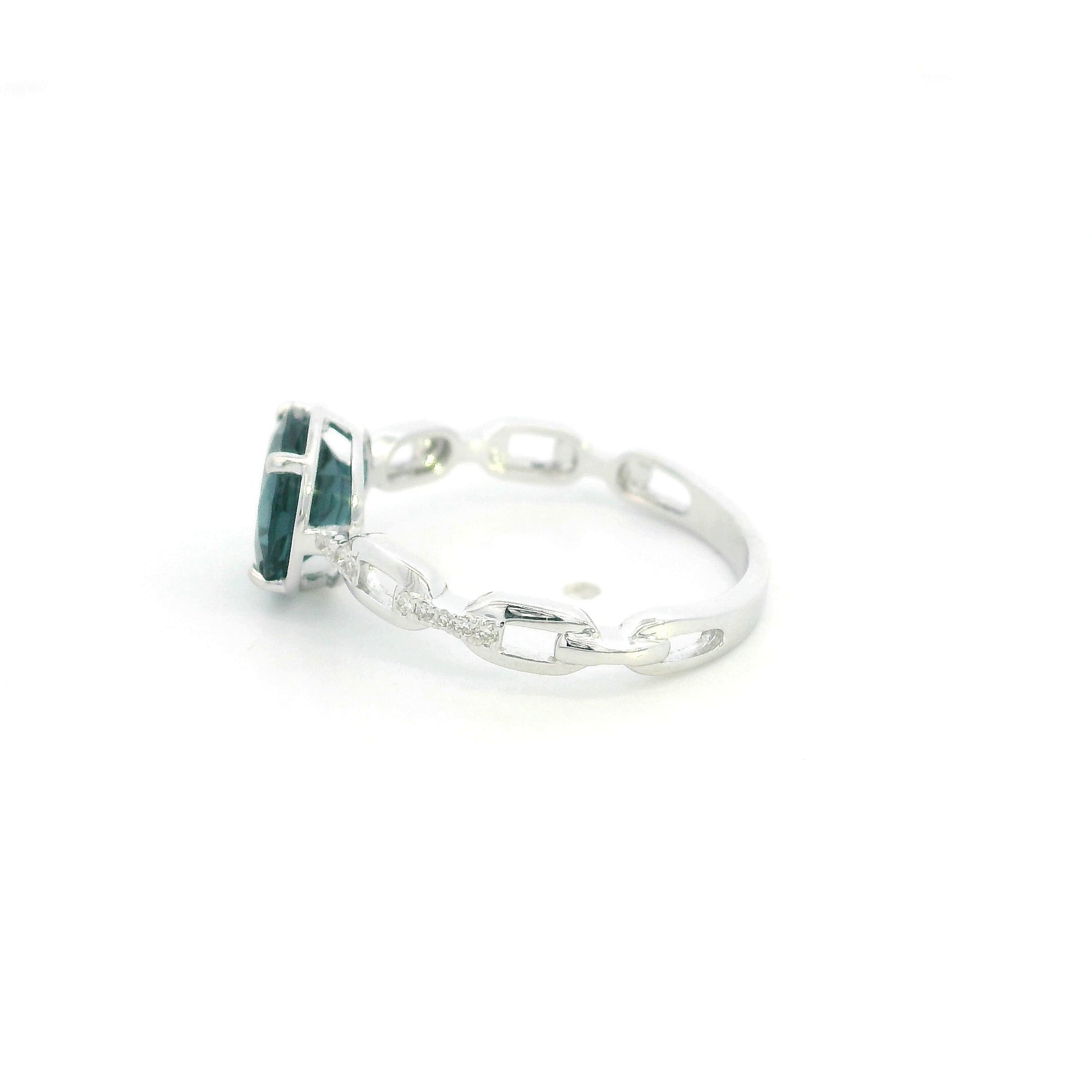 Round London Blue Topaz diamond ring in 18K white gold with sculpted open-detail band