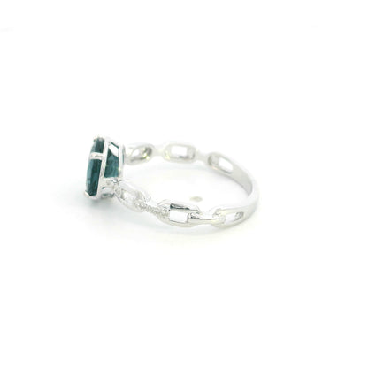 Round London Blue Topaz diamond ring in 18K white gold with sculpted open-detail band