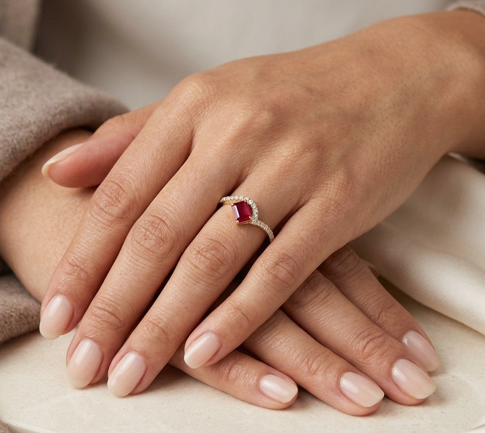 18K yellow gold ruby and diamond ring with angled square red ruby and curved diamond-set band