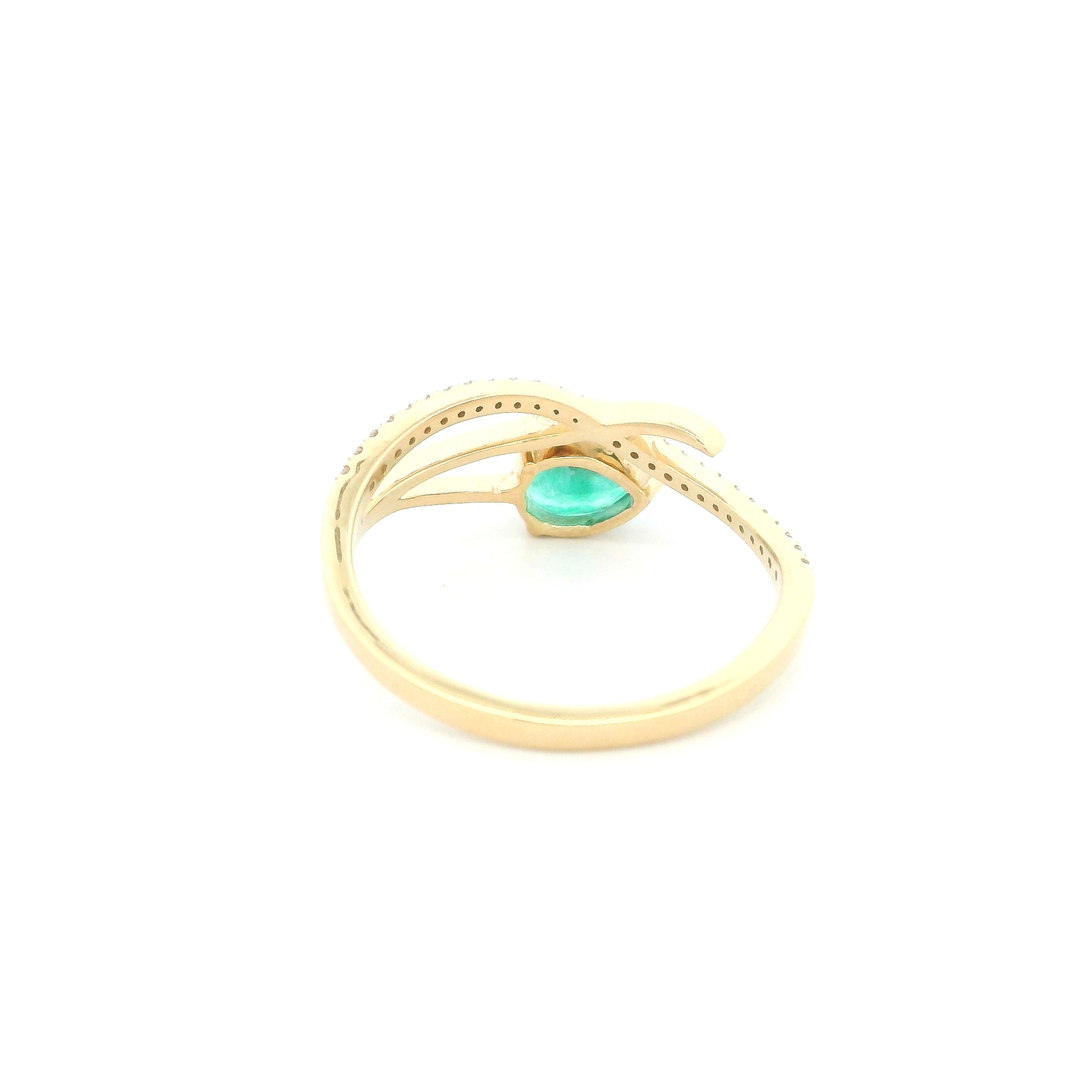 18K yellow gold emerald crossover ring featuring a 0.51 carat natural emerald and 0.09 carat natural diamond accent band.