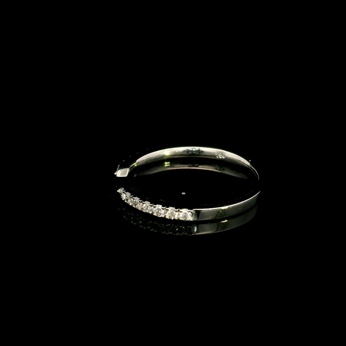 18K white gold open diamond contour ring with curved diamond-set ends, suitable as a stacking ring or wedding band