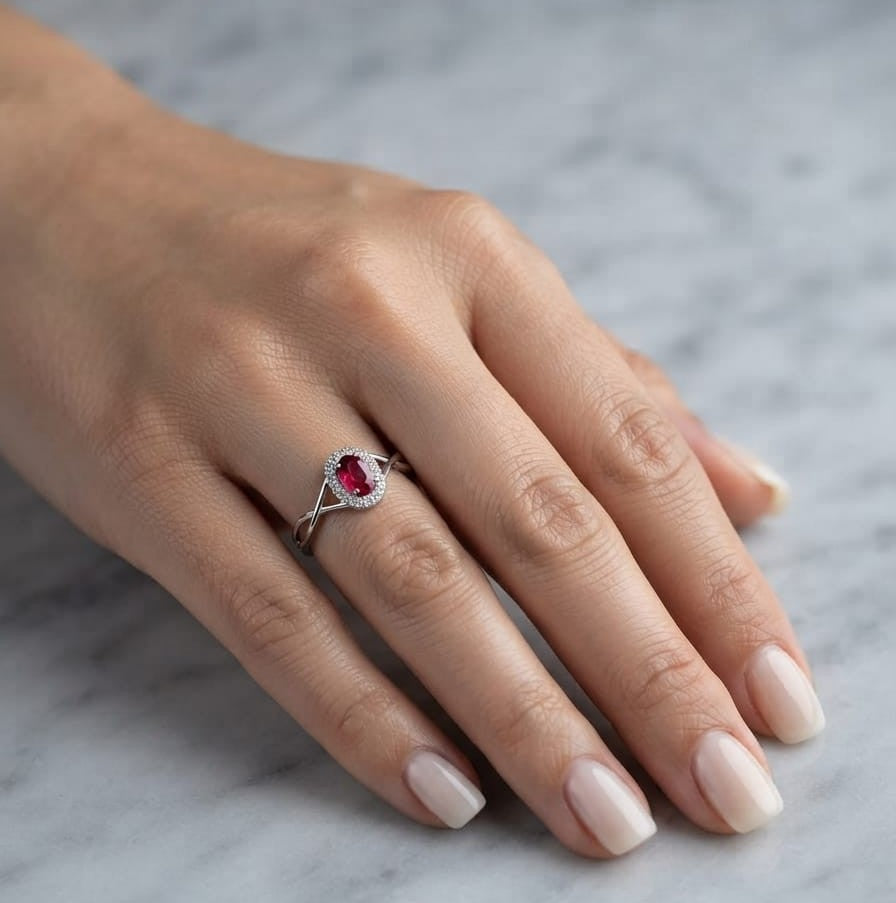 18K White Gold Ruby Halo Ring with 0.52 Carat Oval Ruby and Natural Diamond Halo