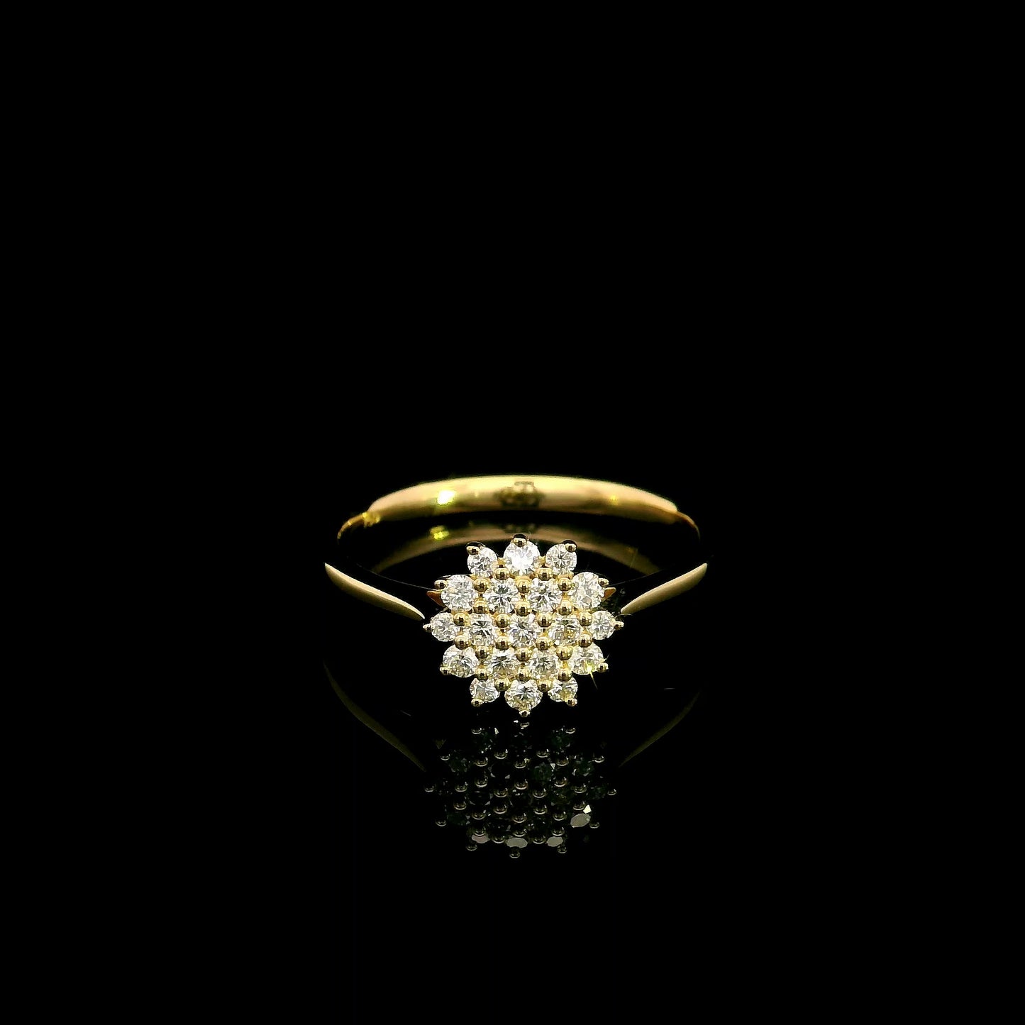 Diamond cluster ring in 18K yellow gold featuring 0.35 carat of round natural diamonds in a floral-inspired arrangement