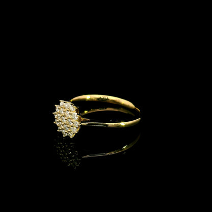 Diamond cluster ring in 18K yellow gold featuring 0.35 carat of round natural diamonds in a floral-inspired arrangement