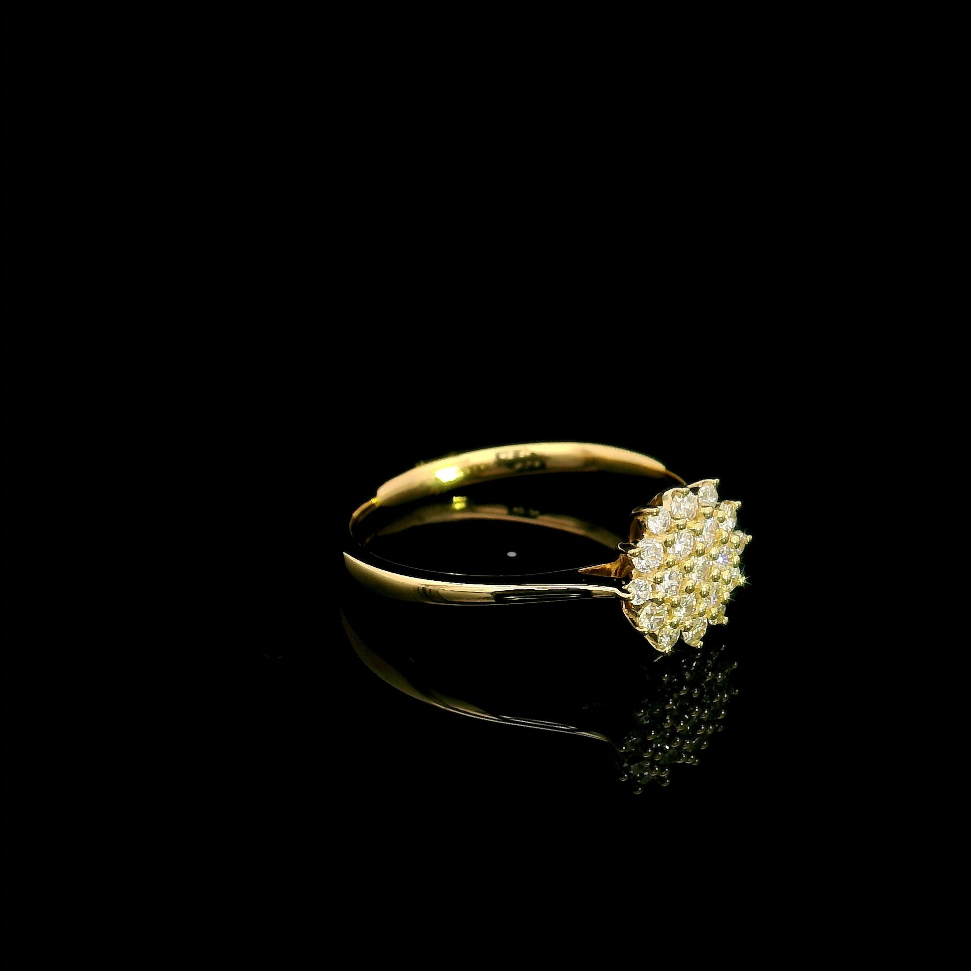 Diamond cluster ring in 18K yellow gold featuring 0.35 carat of round natural diamonds in a floral-inspired arrangement