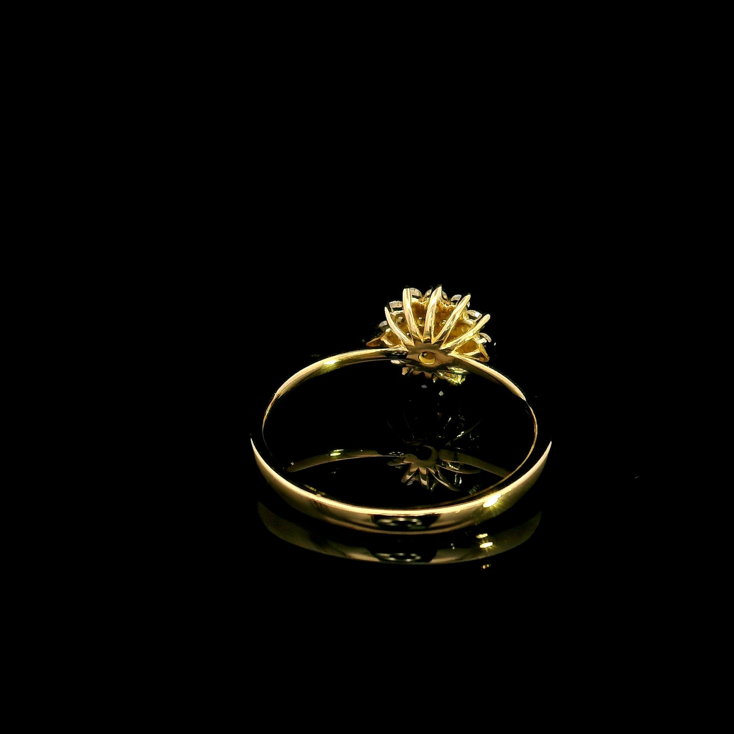 Diamond cluster ring in 18K yellow gold featuring 0.35 carat of round natural diamonds in a floral-inspired arrangement