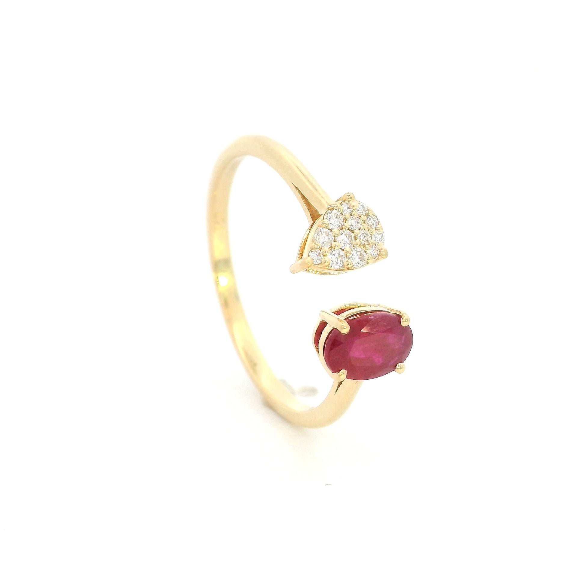 Oval ruby and diamond open ring in 18K yellow gold with pear shaped diamond cluster
