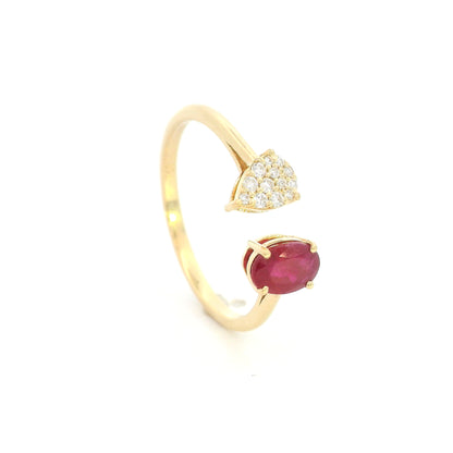 Oval ruby and diamond open ring in 18K yellow gold with pear shaped diamond cluster