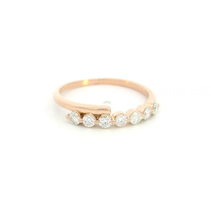 18K rose gold diamond bypass ring with 0.42 carat round diamonds and polished gold crossover design