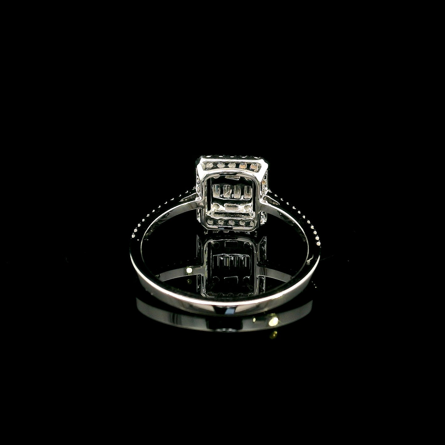 18K White Gold Diamond Halo Ring featuring 0.37 carat natural baguette and round brilliant diamonds in a geometric halo design with a diamond-set band.