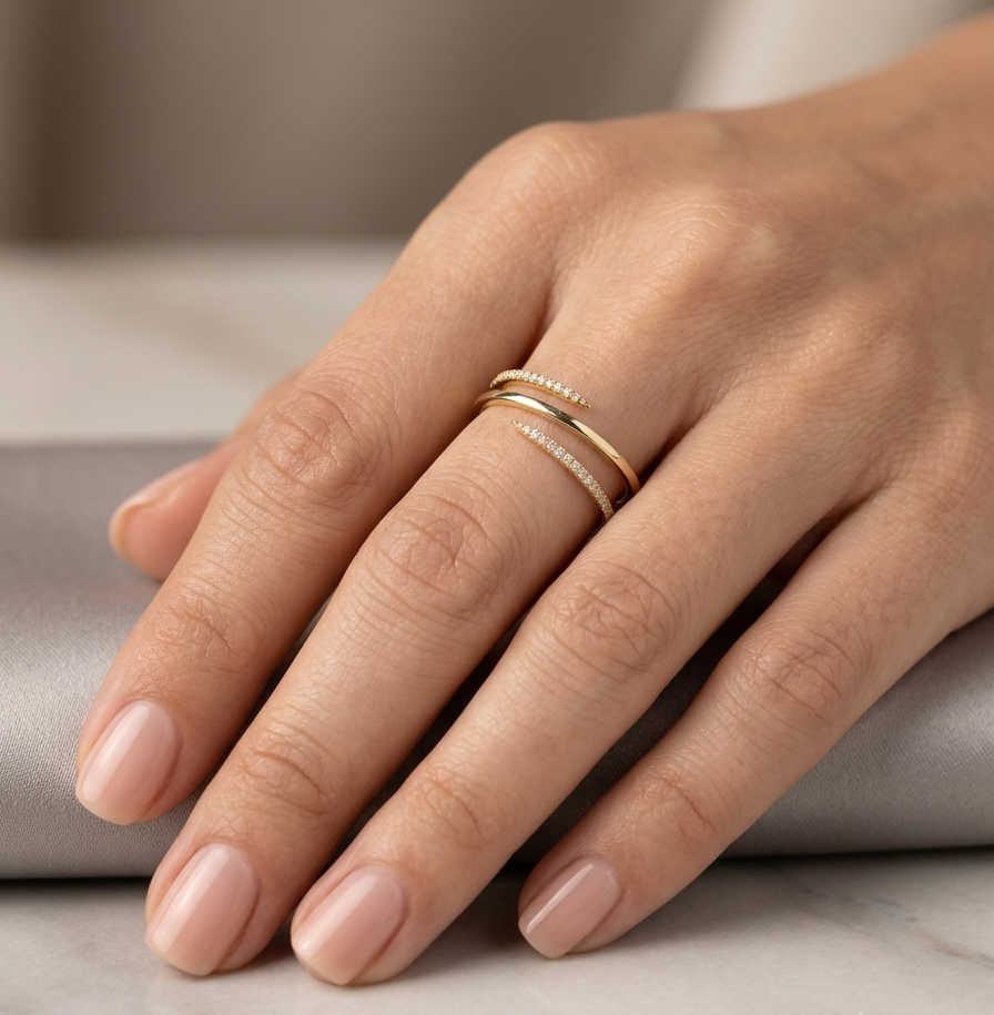 Diamond wrap ring with sculpted curved design in 18K yellow gold
