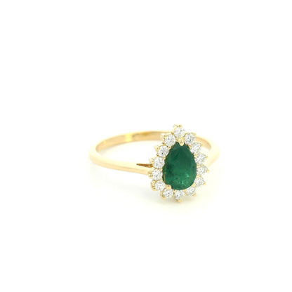Pear shaped natural emerald diamond halo ring in 18K yellow gold