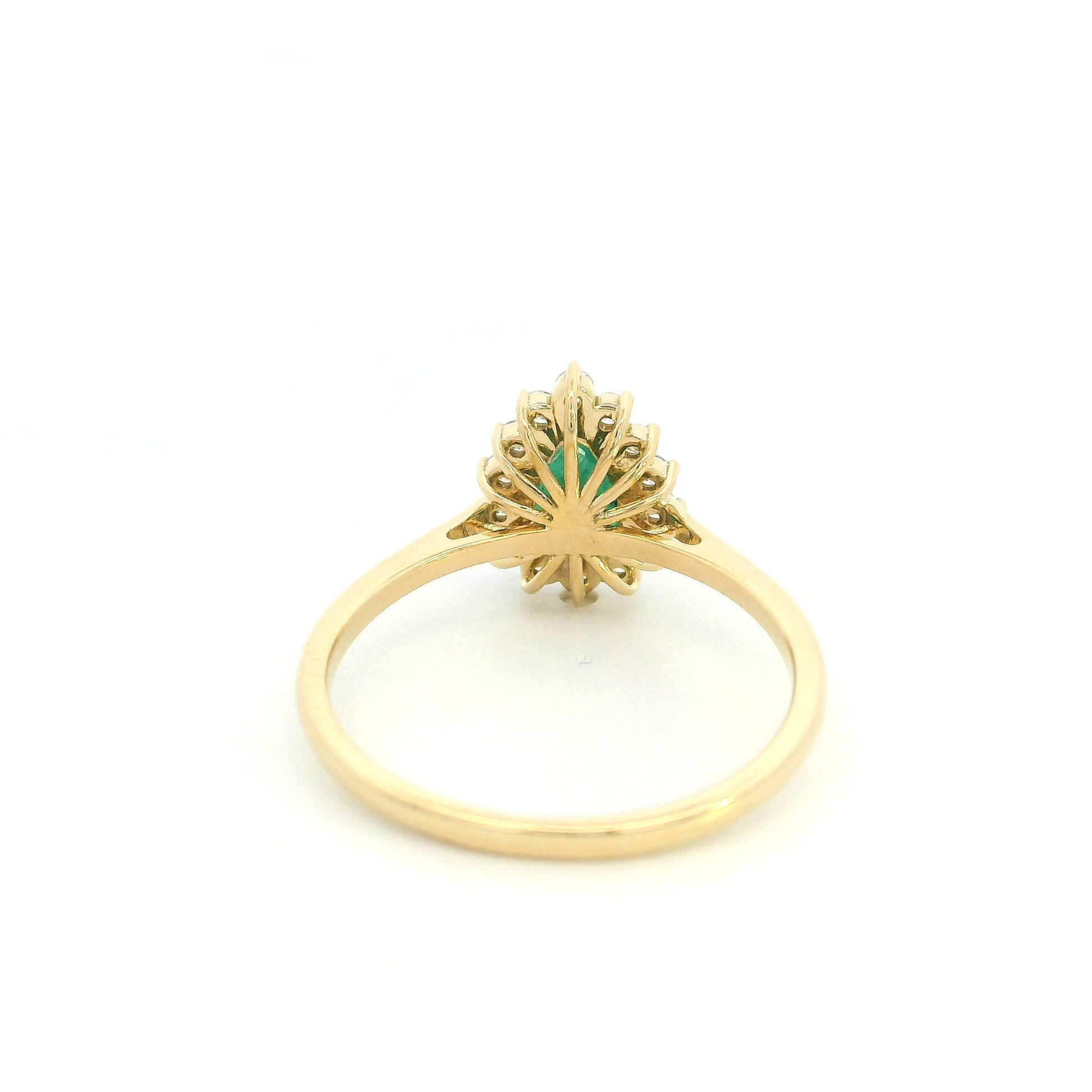 Pear shaped natural emerald diamond halo ring in 18K yellow gold