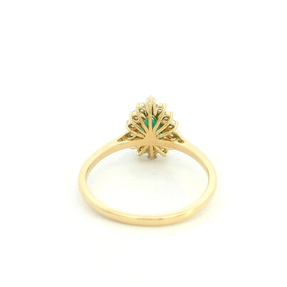 Pear shaped natural emerald diamond halo ring in 18K yellow gold