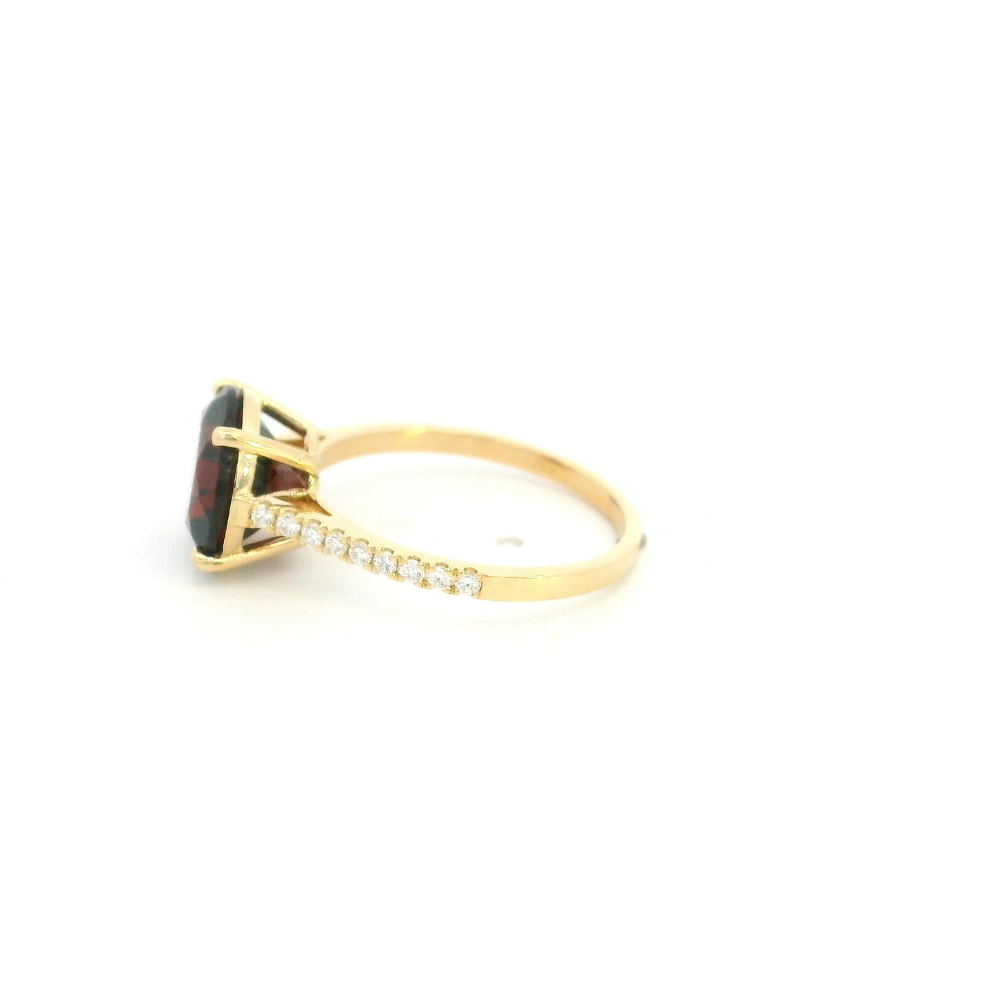 Garnet diamond ring in 18K yellow gold featuring a natural 4.59 carat round-cut garnet with a diamond-set band.