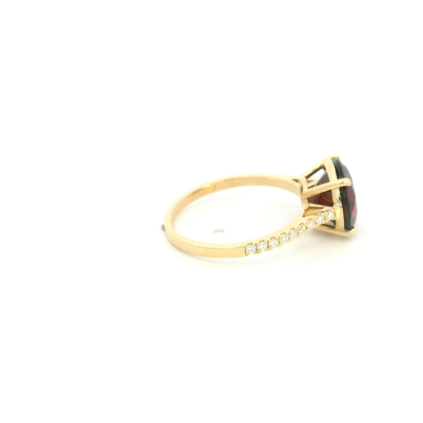 Garnet diamond ring in 18K yellow gold featuring a natural 4.59 carat round-cut garnet with a diamond-set band.