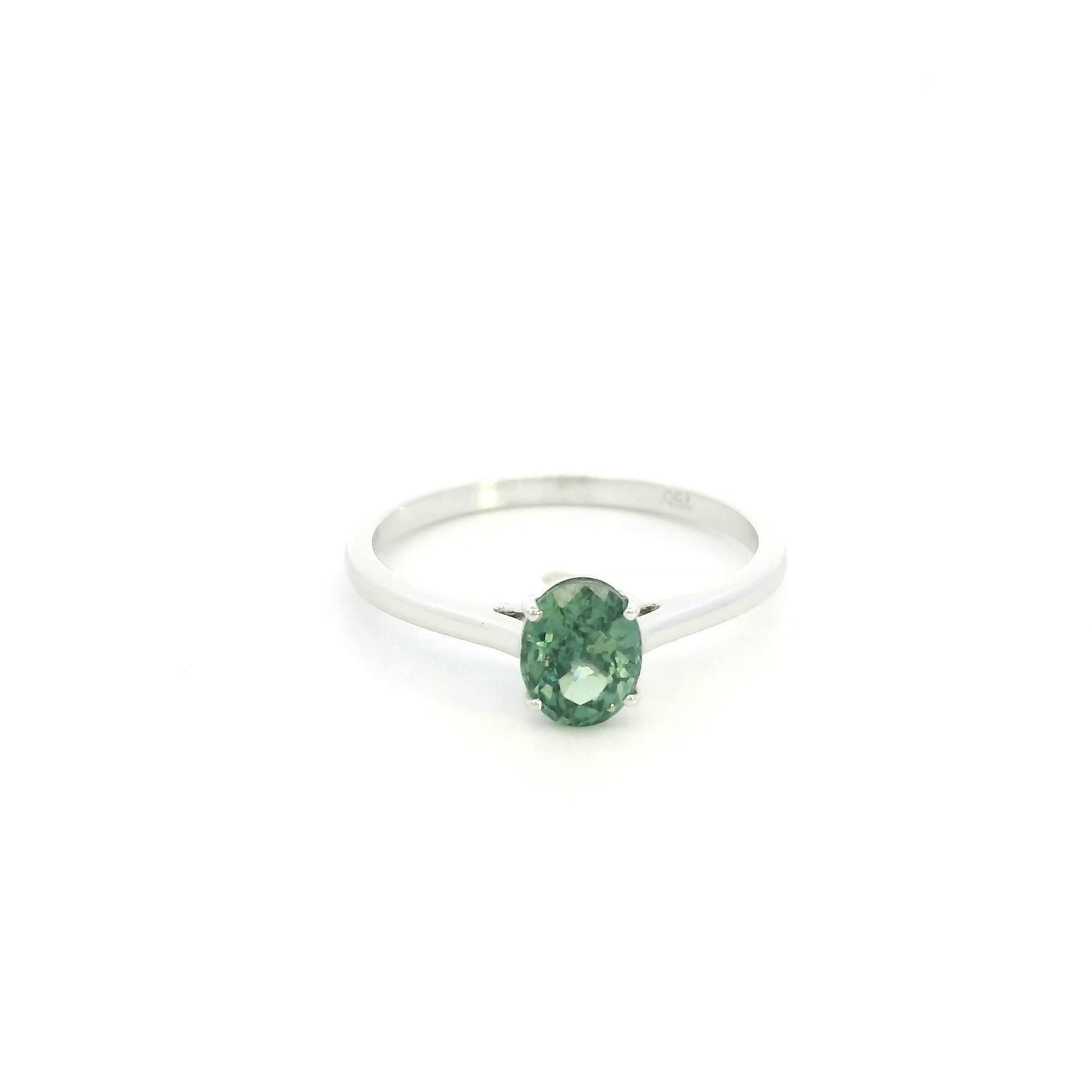 Oval green sapphire solitaire ring in 18K white gold with 1.11 carat natural green sapphire