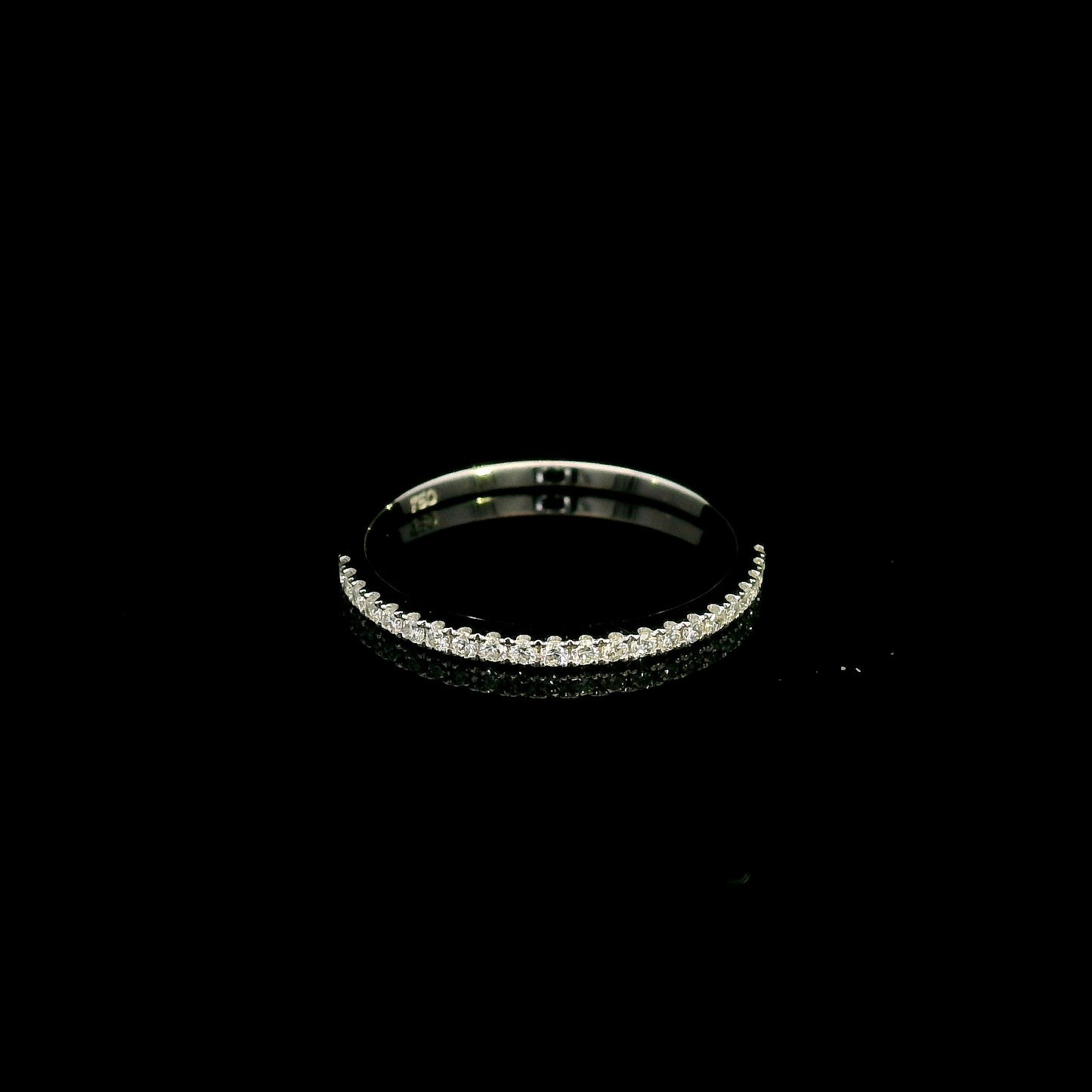 Oval cut diamond bridal set in 18K white gold featuring a GIA certified 1.50 carat natural oval diamond with matching diamond wedding band.